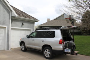 VHF/UHF antenna is forward, above driver's door. Tarheel antenna is mounted on a swing out jerry can holder.